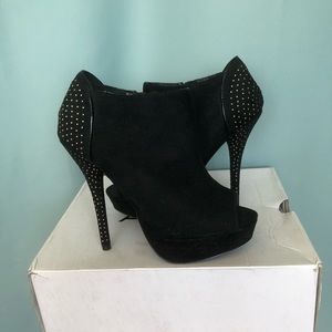 Black open toe bootie with studded heel detail